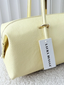 Laura Biaggi torebka kuferek na ramię skórzany żółty