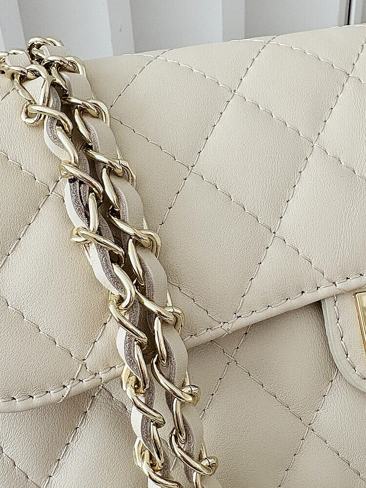 Massimo Contti duża torebka listonoszka skórzana beżowa pikowana z łańcuszkiem