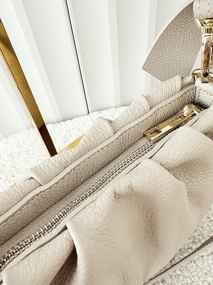 Laura Biaggi torebka kuferek z kokardą skórzana beżowa