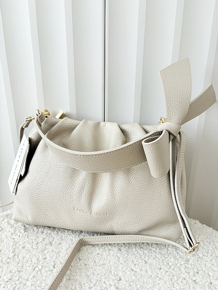 Laura Biaggi torebka kuferek z kokardą skórzana beżowa